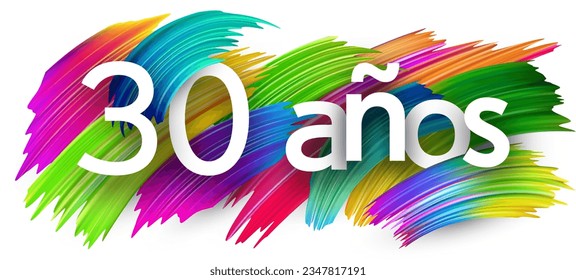 30 years at spanish paper word sign with colorful spectrum paint brush strokes over white. Vector illustration.