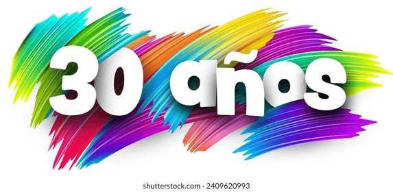 30 years at spanish paper word sign with colorful spectrum paint brush strokes over white. Vector illustration.