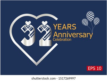 32 years anniversary celebration logotype with silver color isolated on blue background