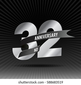 32 years silver anniversary logo celebration with ring and ribbon.