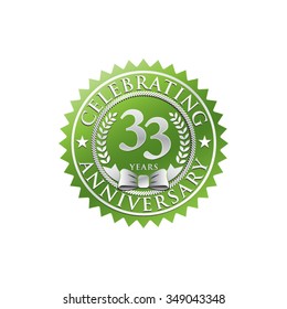 33 years anniversary silver green badge logo