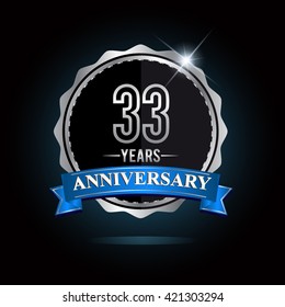 33rd anniversary logo with blue ribbon and silver shiny badge, vector design for birthday celebration