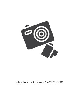 35 mm camera vector icon. filled flat sign for mobile concept and web design. Photo camera and 35 mm film roll glyph icon. Symbol, logo illustration. Vector graphics