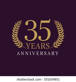 35 years old creative logotype. Congratulating 35th numbers gold colored template framed in palms. Isolated design template. Celebrating tradition three, five in branches. 3rd third place of win.