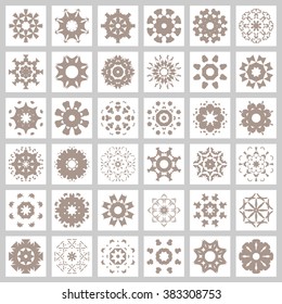 36 Universal different round ornaments, logo icon label design elements set. Monocrome symbols stylized flowers, stars or snowflakes. Abstract geometric shapes collection. Set 07