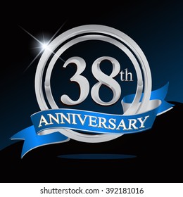 38th anniversary logo with blue ribbon and silver ring, vector template for birthday celebration.