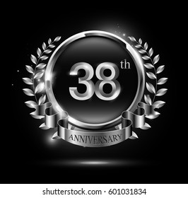 38th silver anniversary celebration logo with ring and ribbon, laurel wreath design