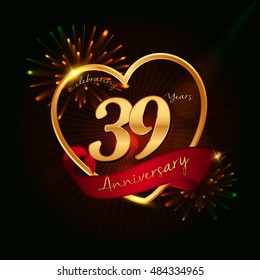 39 years anniversary logo golden colored,with love shape, red ribbon, and fireworks background