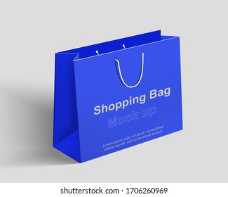 Bolso de compras azul en 3D se burla. Diseño de la plantilla de embalaje en blanco. paquete de papel horizontal con espacio de copia. 3d aislado en segundo plano. ilustración vectorial realista.