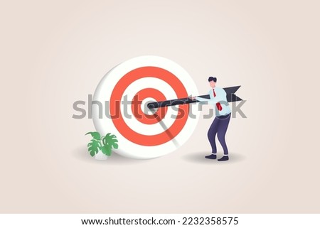 3D Business goals, goals or targets, goals and resolutions to achieve success, aspirations and motivation to achieve goals concept, confident businessman standing with arrow on target