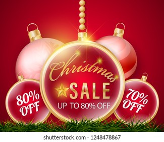 3D Christmas balls hanging sale promotional banner and percent discount price tags with decoration element on grass and red background.