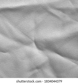 3-D fabric texture in shades of grey.