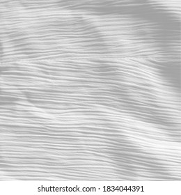 3-D fabric texture in shades of grey.
