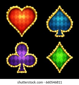 3d game card suits. Gold casino icons with glowing lights. Eps10 vector.