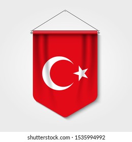 3D realistic pennant with flag of Turkey Premium Vector