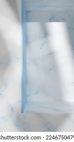 3d render of vertical marble background with blue wall and empty podium. Clean surface for beauty products advertisement and banner creation. Gobo light effect on stone wall.