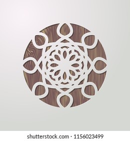 3D round tribal decoration on wooden textured background. Vintage lacy ornamental symbol. Simple mandala circular pattern laser cutting template. Vector illustration