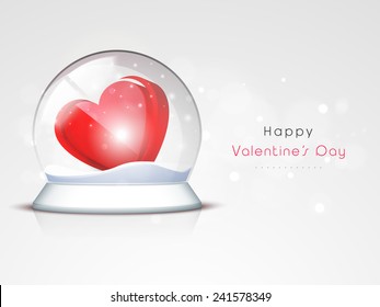 3D shiny red  heart in a snow dome for Happy Valentine's Day celebration on shiny grey background.