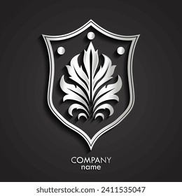 3d silver shield with decorative floral ornament logo