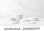 3D white round podium set background with light and shadow. Abstract geometric composition in minimalist design. 3D studio display showroom product pedestal, Fashion stage showcase mockup scene.