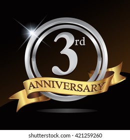 3rd anniversary logo, with shiny silver ring and gold ribbon isolated on black background. vector design for birthday celebration.