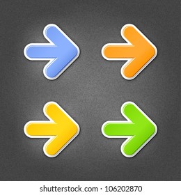 4 colored arrow sign stickers. Smooth green, orange, yellow, blue internet web button with drop shadow on gray background with noise effect. This vector illustration design element saved in 10 eps