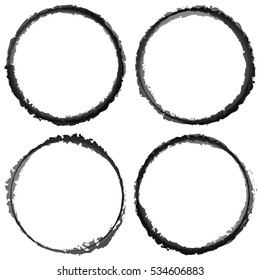 4 grungy circle shapes with painted effect. Textured, distressed circle vector design elements