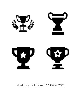 4 honor icons in vector set. trophy and first prize trophy illustration for web and graphic design