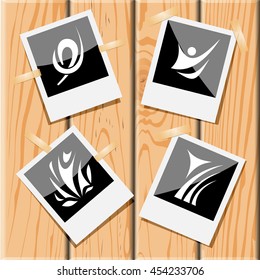4 images of unique abstract forms. Photo frames on wooden desk. Vector icons set.