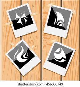 4 images of unique abstract forms. Photo frames on wooden desk. Vector icons set.