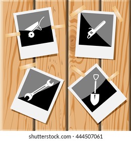 4 images: wheelbarrow, gasoline-powered saw, spanner, spade. Angularly set. Photo frames on wooden desk. Vector icons.