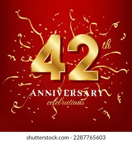42 golden numbers and anniversary celebrating text with golden confetti spread on a red background