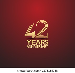 42 years golden anniversary logotype with labyrinth style number isolated on red background
