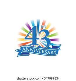 43rd anniversary ribbon logo with colorful rays of light