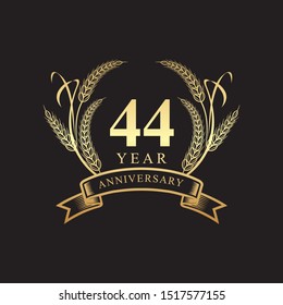 44th golden anniversary logo with ring and ribbon, laurel wreath vector design isolated on black background