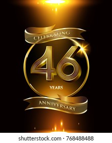 46 years anniversary logo with shiny ribbon and golden ring isolated on black background