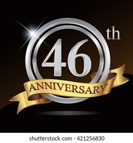 46th anniversary logo, with shiny silver ring and gold ribbon isolated on black background. vector design for birthday celebration.