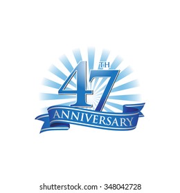 47th anniversary ribbon logo with blue rays of light