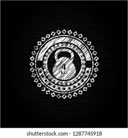 4kg kettlebell icon inside chalk emblem written on a blackboard