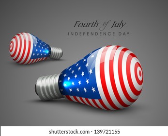 4th of July, American Independence Day concept with bulb colored in national flag colors on grey background.