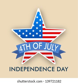 4th of July, American Independence Day concept with star in national flag colors on brown background.