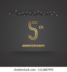 5 anniversary design for company celebration event with golden multiple line font and confetti isolated on dark grey background 