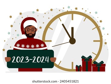 5 minutes for the new year. A man holds a poster with the text 2023-2024.