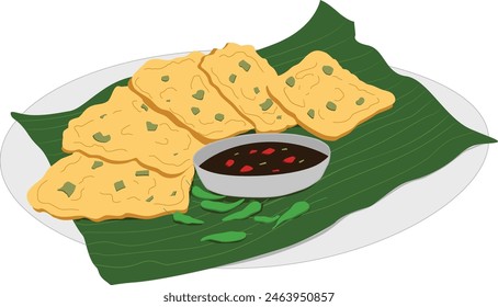 5 Vector tempeh mendoan espolvoreado con puerro, salsa de soja y chile verde. Servido en un plato envuelto con hojas de plátano