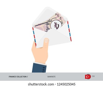 5 Turkish Lira Banknotes in envelope hold in hand. Flat style opened white envelope with cash. Salary payout or corruption concept.