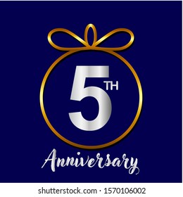 5 years anniversary golden and silver color with circle ring isolated on black background for anniversary celebration event