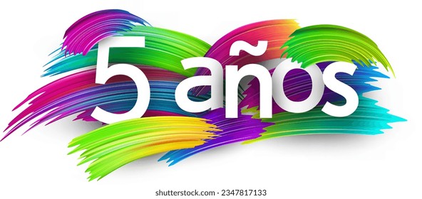 5 years at spanish paper word sign with colorful spectrum paint brush strokes over white. Vector illustration.