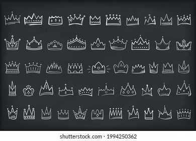 50 Hand drawn doodle crowns, king or queen crown icons, vector eps10 illustration