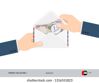 50 United Arab Emirates Dirham Banknotes in envelope hold in hand. Flat style opened white envelope with cash. Salary payout or corruption concept.