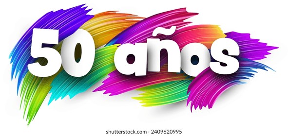 50 years at spanish paper word sign with colorful spectrum paint brush strokes over white. Vector illustration.